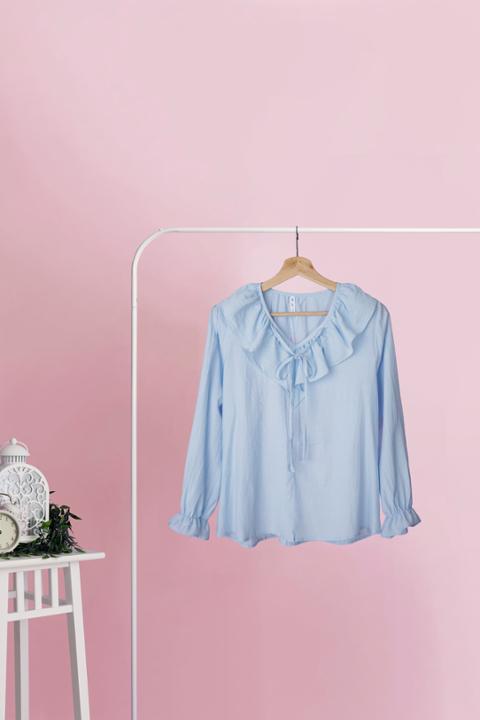 Foto model menggunakan produk Natasha Pastel Ruffle Blouse