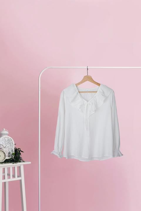 Foto model menggunakan produk Natasha Pastel Ruffle Blouse