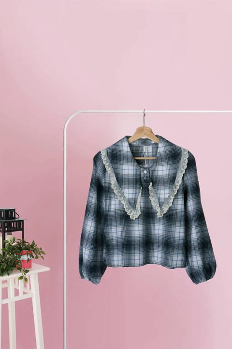 Foto model menggunakan produk Judith Flannel Tartan Blouse